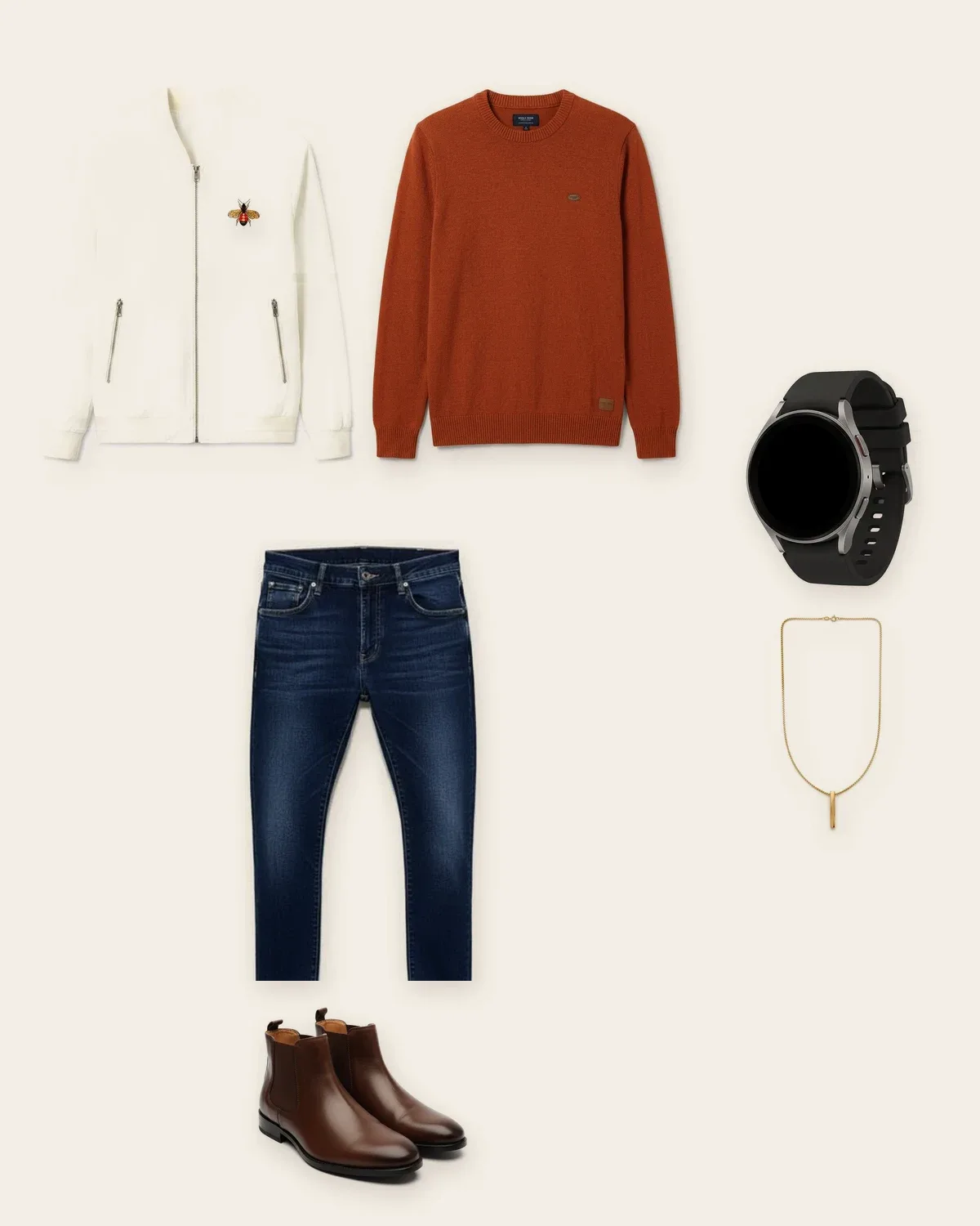 White bomber jacket, burnt orange sweater, dark jeans and brown Chelsea boots