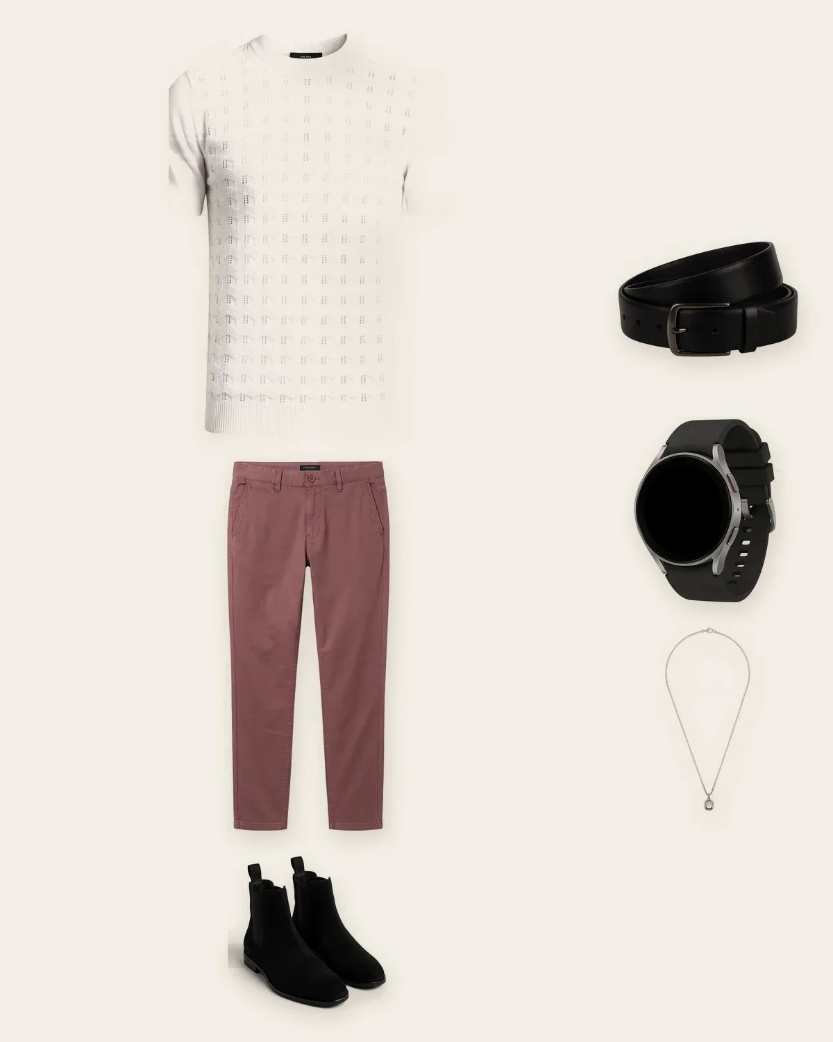 A white knit top, dusty rose chinos, black Chelsea boots, a belt, a watch and a chain